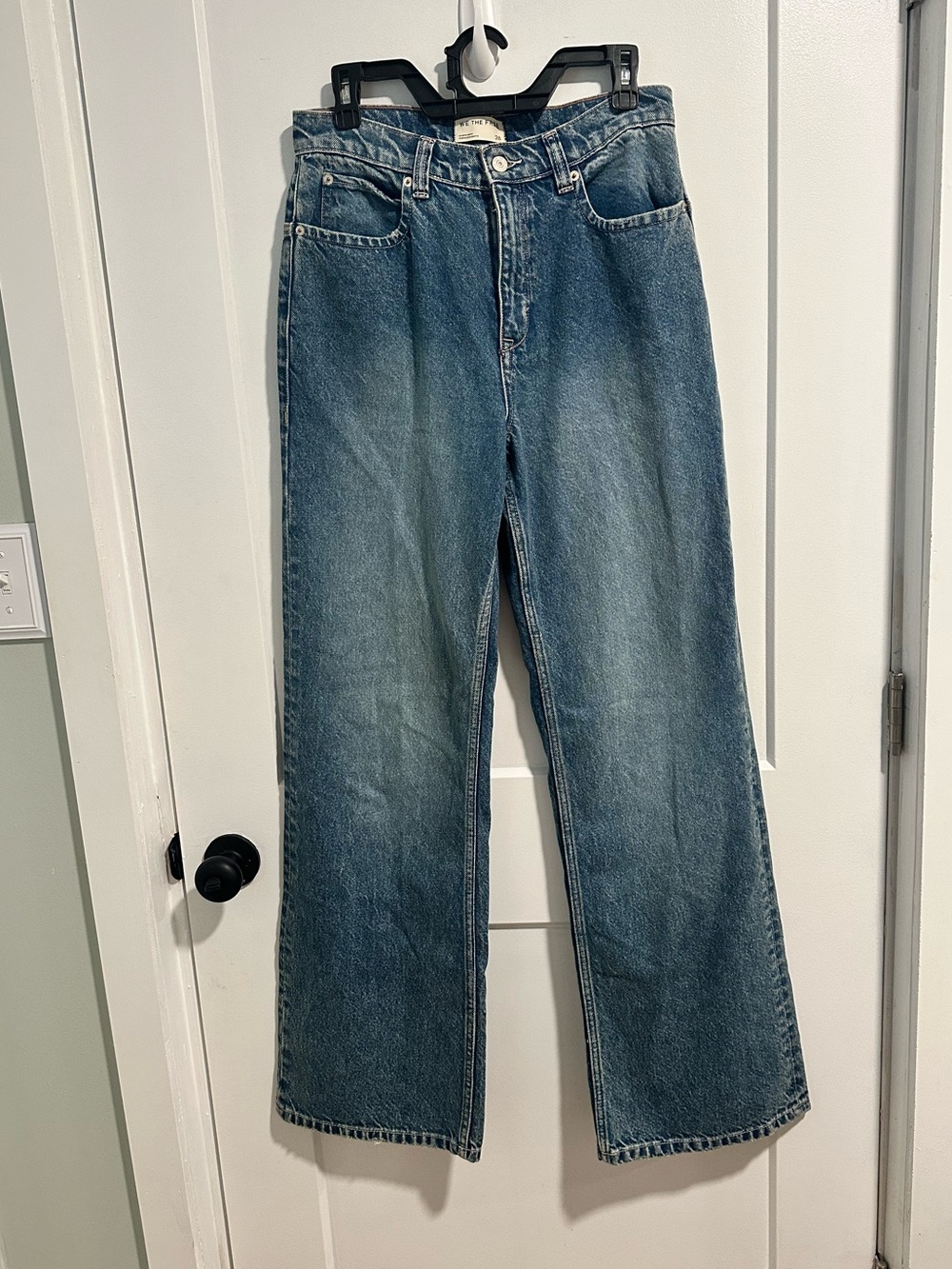 We The Free Tinsley baggy high-rise straight-leg jeans in a light blue denim.